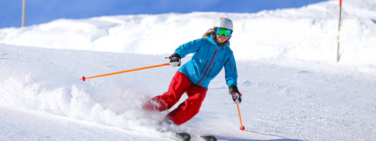 Woman skiing down a slope