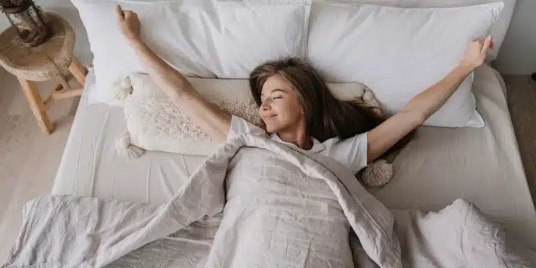 woman waking up rested