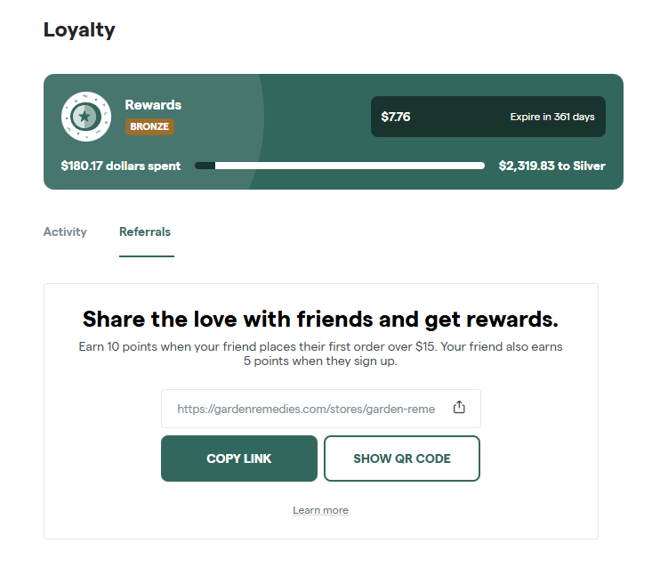Garden Remedies loyalty referral program banner showing earn points options and referral link sharing